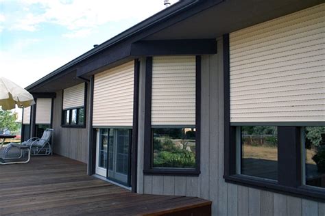 fabric hurricane shutters vs metal|roll down hurricane screens cost.